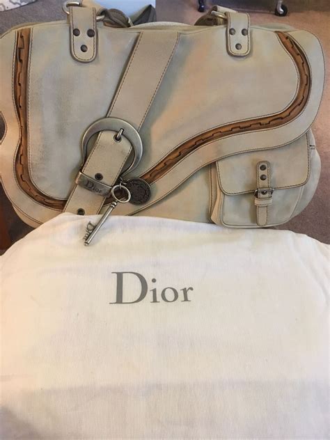 dior guacho|christian Dior gaucho bags.